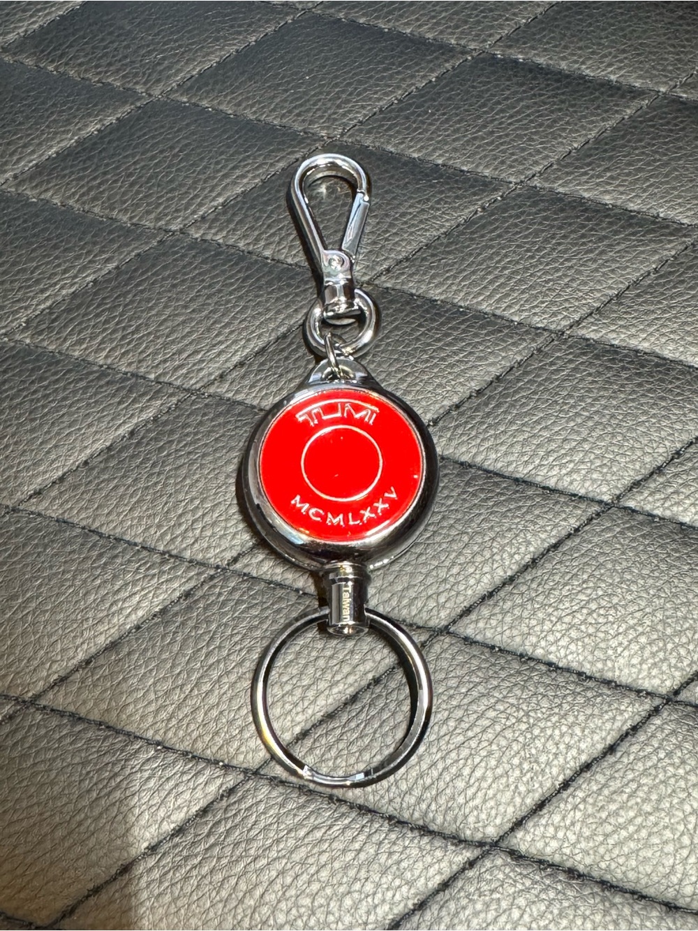 Tumi Red Round Key Reel with Silver Clip